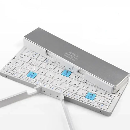 JOMAA Compact Wireless Keyboard - Portable, Foldable Design with Built-in Stand for Phones & Tablets